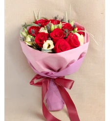 Beautiful red roses and lusianthus